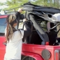 Preview: Jeep Wrangler JK 4türer XHD Verdeck Ersatz Verdeckhülle mit getönten Scheiben und Montage Assistent Schwarz Diamond 07-09